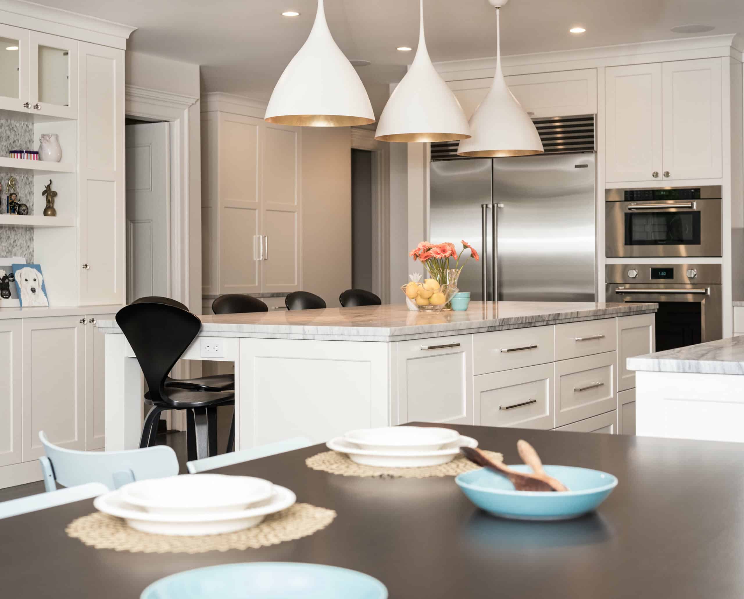 Classic white Sub-Zero and Wolf kitchen remodel by Right Angle Kitchens & Design