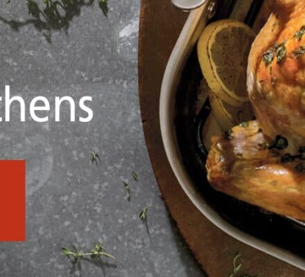 Roast turkey garnished with herbs sits in a pan next to the text: "Thanksgiving Secrets From Clarke's Test Kitchens. Featuring luxury kitchen appliance tips. Hors d'oeuvres.