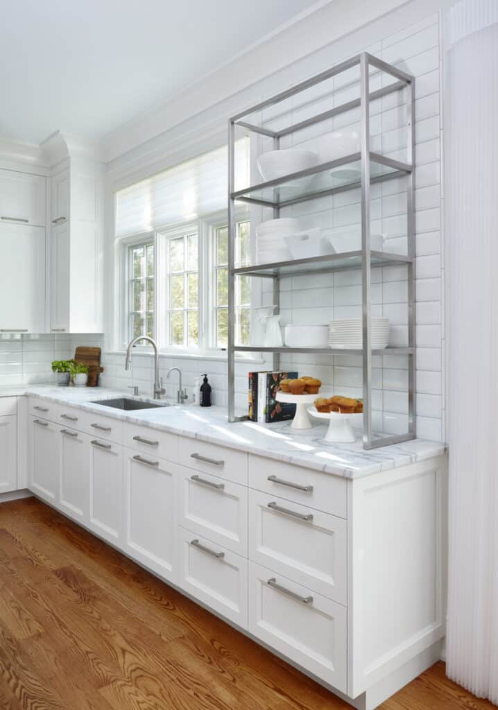 Peter Deane’s inspiring metal open shelf cabinet adds a new dimension to this Sub-Zero and Wolf kitchen.