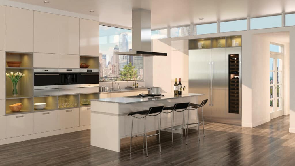 Modern kitchen with an island, three bar stools, premium Wolf appliances, a wine fridge, and large windows overlooking a cityscape—perfect for those seeking a luxury kitchen appliance experience.