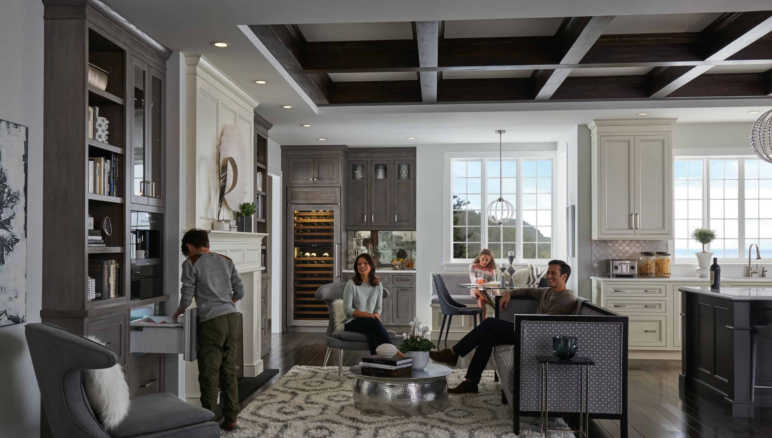 Sub-Zero refrigerator drawers are designed into this great room space to position drinks away from kitchen traffic.