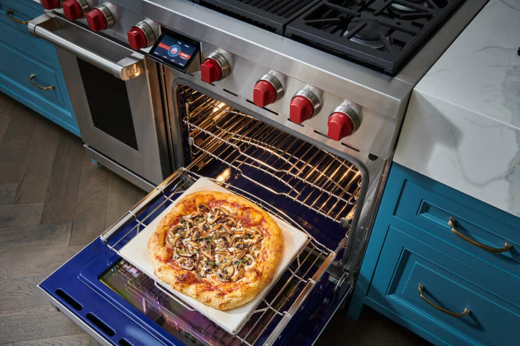 New Wolf Dual Fuel Range Door Open With Pizza In The Oven