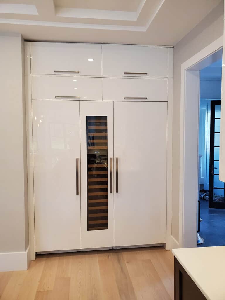 Sub-Zero column refrigerator, freezer and wine storage make a beautiful statement.
