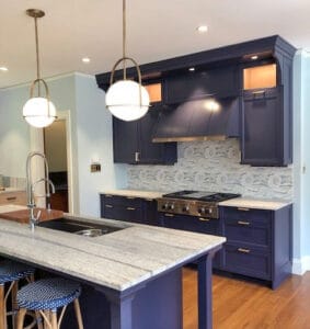 The Galley, a revolutionary workstation, fits seamlessly into this kitchen remodel in a 1912 Craftsman-style masterpiece in Maine.