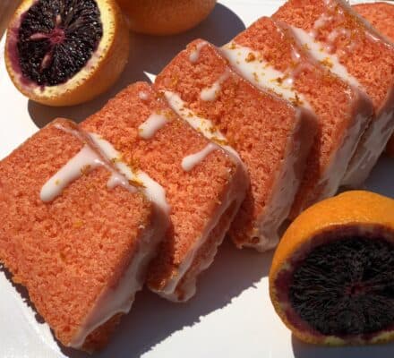 Moist and zesty citrus loaf cake topped with a light glaze