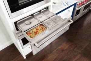 A Wolf Warming Drawer can be ordered with stainless steel containers.