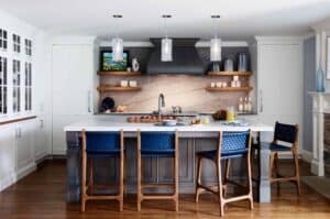Inspiration abounds in the mixture of color and texture in this kitchen by Interiology, featured in Clarke’s kitchen designer gallery.