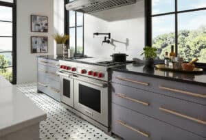 Wolf Dual-Fuel High-end kitchen ranges with pot filler surrounded with windows