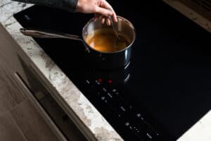 The Ceran cooking surface of a Wolf Induction Cooktop is easy to clean and it is very resistant to scratching.