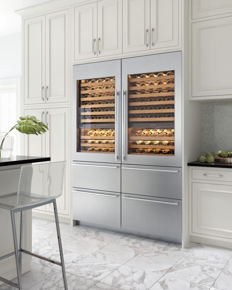 Sub-Zero wine refrigeration can be configured to fit beautifully in a kitchen, with wine storage above and refrigerator drawers below.